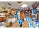 Large kitchen and dining area featuring wooden cabinetry and storage, and natural light at 117 Myrtle Ln, Plant City, FL 33565