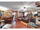 Spacious living room with wooden accents, cozy seating, and a functional layout at 117 Myrtle Ln, Plant City, FL 33565