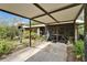 Covered patio provides the perfect setting for outdoor living and entertaining at 117 Myrtle Ln, Plant City, FL 33565