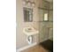 Bathroom featuring modern fixtures, tiled shower, and unique sink at 1203 Durant Rd, Brandon, FL 33511
