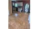 Bright kitchen featuring white cabinets, black countertop, and stainless steel appliances at 1203 Durant Rd, Brandon, FL 33511