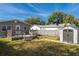Backyard featuring a shed and wooden deck, perfect for enjoying outdoor living and extra storage at 122 10Th Ave, Indian Rocks Beach, FL 33785