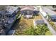 Aerial view of a fenced backyard with a deck, shed, and grass at 122 10Th Ave, Indian Rocks Beach, FL 33785