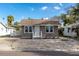 Charming single-story home with a well-maintained front yard at 122 10Th Ave, Indian Rocks Beach, FL 33785
