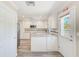 Bright kitchen with stainless steel appliances and ample counter space at 122 10Th Ave, Indian Rocks Beach, FL 33785