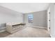 Neutral bedroom with a comfortable daybed and a window providing natural light at 12795 Fisherville Way, Riverview, FL 33579