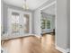 Elegant foyer features wood flooring and a decorative glass double door at 12795 Fisherville Way, Riverview, FL 33579