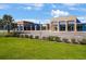 Exterior view of Warren Hope Dawson Elementary School on a sunny day, showcasing its modern architectural design at 12795 Fisherville Way, Riverview, FL 33579