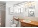 Bathroom featuring a sink, vanity and shower/tub combination at 12904 Teakwood Ln, Hudson, FL 34667