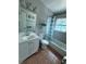 Functional bathroom with a single vanity, toilet, and shower/tub combination at 1407 College Park Ln, Tampa, FL 33612
