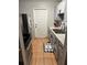 Functional kitchen featuring modern appliances, ample cabinet space, and easy access to the back door at 1407 College Park Ln, Tampa, FL 33612