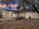 Charming backyard with a gazebo, outdoor seating, and a peaceful ambiance at 14350 11Th St, Dade City, FL 33523