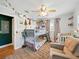 Shared bedroom offering a bunk bed, crib, plush chair, toys and ample natural light at 14350 11Th St, Dade City, FL 33523