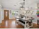 Dining room with farmhouse table and bright natural light at 14350 11Th St, Dade City, FL 33523