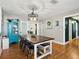 Spacious dining room featuring stylish decor, ample seating, and modern lighting at 14350 11Th St, Dade City, FL 33523
