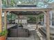 Backyard gazebo offering comfortable seating, a view of the yard and serene atmosphere at 14350 11Th St, Dade City, FL 33523