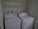 The laundry area with a standard washer and dryer set at 14614 Lake Magdalene Cir, Tampa, FL 33613