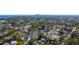 This aerial view shows a beautiful, tree-filled neighborhood with tree-lined streets at 1820 Mississippi Ave Ne, St Petersburg, FL 33703