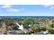 An aerial view shows the house and its proximity to the water and surrounding neighborhood at 1820 Mississippi Ave Ne, St Petersburg, FL 33703