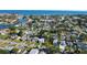 The aerial view displays the homes in the area and proximity to the water and canals at 1820 Mississippi Ave Ne, St Petersburg, FL 33703