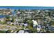 This aerial view shows the real estate property near the canal and neighborhood at 1820 Mississippi Ave Ne, St Petersburg, FL 33703
