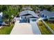 Charming single Gathering home with a beautifully landscaped yard and a long, spacious driveway at 1820 Mississippi Ave Ne, St Petersburg, FL 33703