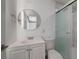 Modern bathroom features a sleek vanity and glass-enclosed shower at 1820 Mississippi Ave Ne, St Petersburg, FL 33703
