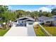 Charming single Gathering home with a beautifully landscaped yard and a long, spacious driveway at 1820 Mississippi Ave Ne, St Petersburg, FL 33703