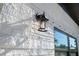 Close up of home's exterior lighting fixture at 1820 Mississippi Ave Ne, St Petersburg, FL 33703