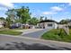Charming single Gathering home with a beautifully landscaped yard and a long, spacious driveway at 1820 Mississippi Ave Ne, St Petersburg, FL 33703