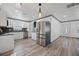 Modern kitchen featuring new stainless steel appliances, white cabinets, and lots of natural light at 1820 Mississippi Ave Ne, St Petersburg, FL 33703