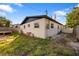 The home has a large backyard with green grass and a new white fence for added privacy at 1820 Mississippi Ave Ne, St Petersburg, FL 33703
