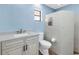 Stylish bathroom with vessel sink, tiled shower, and modern fixtures at 2800 Gulf Blvd Unit # 1A, Belleair Beach, FL 33786