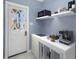Coffee bar with storage cabinets at 2800 Gulf Blvd Unit # 1A, Belleair Beach, FL 33786
