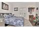 Well-decorated bedroom featuring stylish furnishings, decor, and personal touches at 29540 Chapel Park Dr, Wesley Chapel, FL 33543