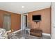 Basement with TV and decoratively painted walls at 3105 Gordon Ct, Tampa, FL 33619