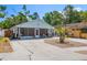 Charming single story home featuring a screened porch, landscaped front yard and spacious driveway at 3105 Gordon Ct, Tampa, FL 33619