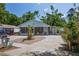 Charming single story home featuring a screened porch, landscaped front yard and spacious driveway at 3105 Gordon Ct, Tampa, FL 33619
