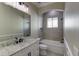 Elegant bathroom with granite countertops, a tiled shower and tub, and modern fixtures at 324 3Rd N Ave, Safety Harbor, FL 34695