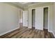 Bedroom with beautiful wood floors, closet and white trim at 324 3Rd N Ave, Safety Harbor, FL 34695