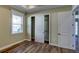 Bedroom with hardwood floors and closet at 324 3Rd N Ave, Safety Harbor, FL 34695