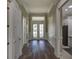 Hallway with hardwood flooring and decorative trim at 324 3Rd N Ave, Safety Harbor, FL 34695