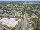 Overhead view of home nestled in a leafy suburb near school, displaying the lush surroundings and nearby amenities at 3404 33Rd Street W Ct, Bradenton, FL 34205