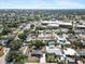 Overhead shot of a residential neighborhood, highlighting mature trees and nearby community amenities at 3404 33Rd Street W Ct, Bradenton, FL 34205