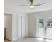 Bedroom with ample natural light, features french doors to backyard, ceiling fan and double door closet at 3404 33Rd Street W Ct, Bradenton, FL 34205