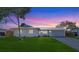 Charming single-story home featuring a freshly painted exterior, updated landscaping, and a spacious front yard at 3404 33Rd Street W Ct, Bradenton, FL 34205