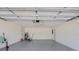 Spacious garage with epoxy flooring and overhead lighting at 3404 33Rd Street W Ct, Bradenton, FL 34205