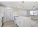 Updated kitchen featuring new appliances, a center island with a cooktop, and modern hardware at 3404 33Rd Street W Ct, Bradenton, FL 34205