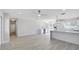 Spacious open-concept living space with new floors, modern fixtures, and lots of natural light at 3404 33Rd Street W Ct, Bradenton, FL 34205