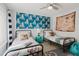 Charming bedroom with two twin beds, nautical decor, and playful pirate accents at 3675 41St S Way # K, St Petersburg, FL 33711